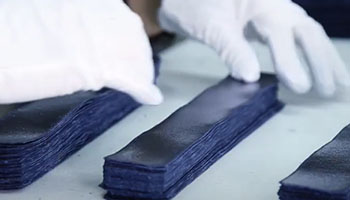 Inspecting individual pieces of handbags